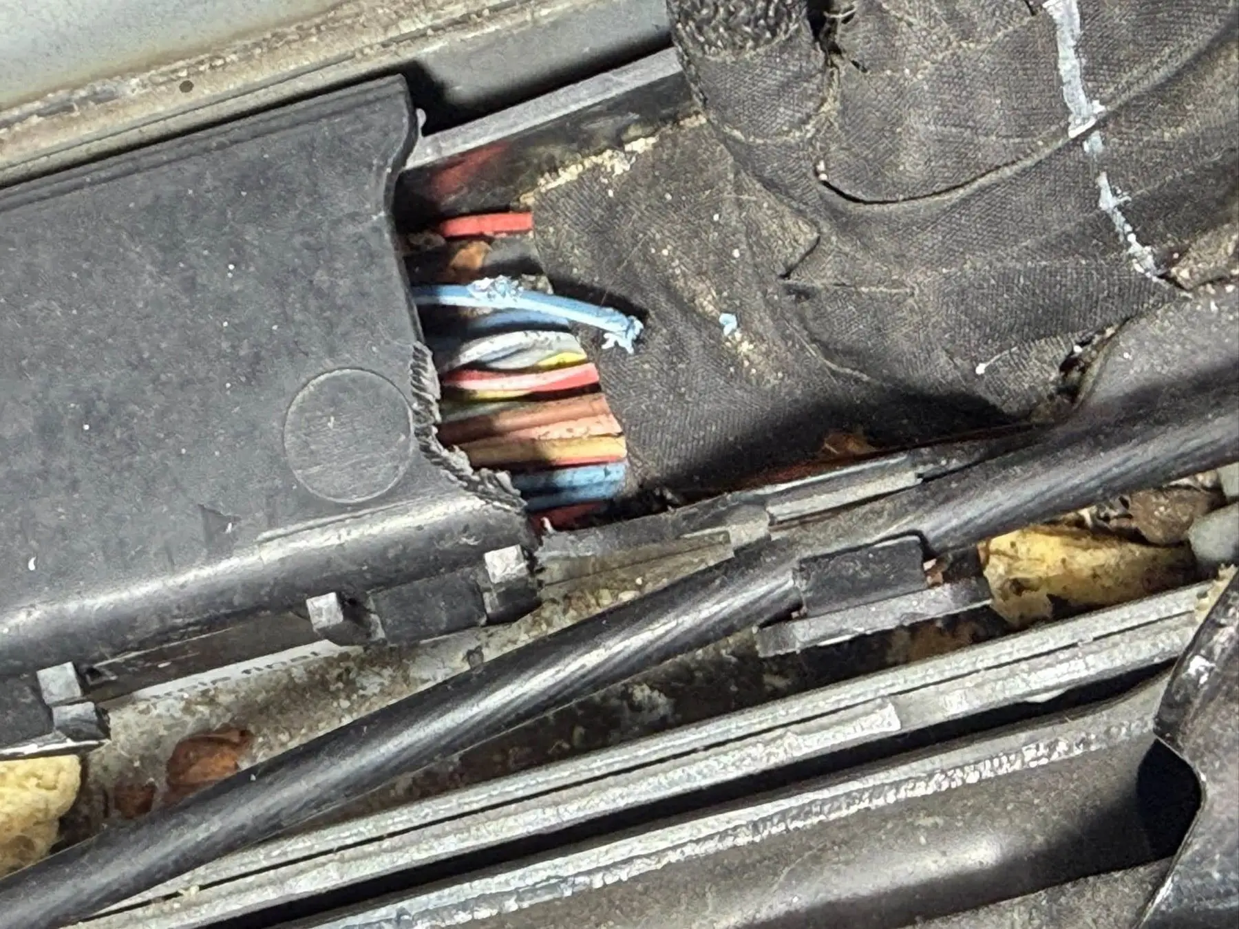 Damaged wiring loom found during fault finding on a car that would not start